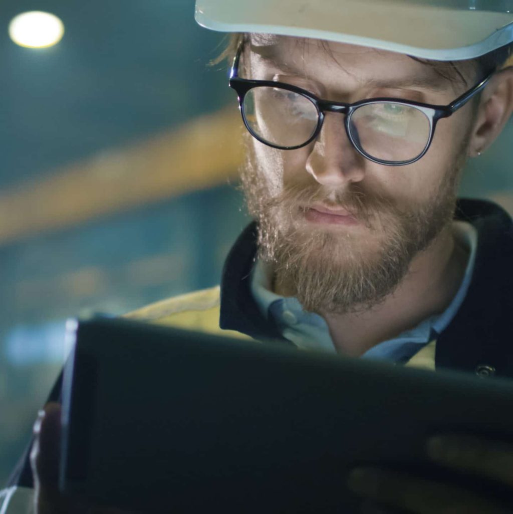 Engineer working on tablet